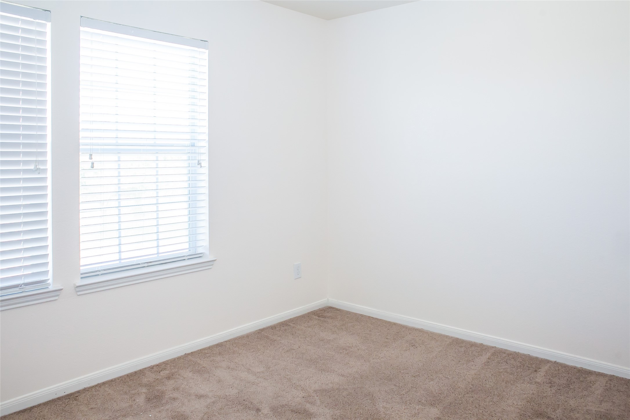 7015 Rancho Mission Drive Houston, TX 77083 - Photo 17 of 21 an empty room with a window