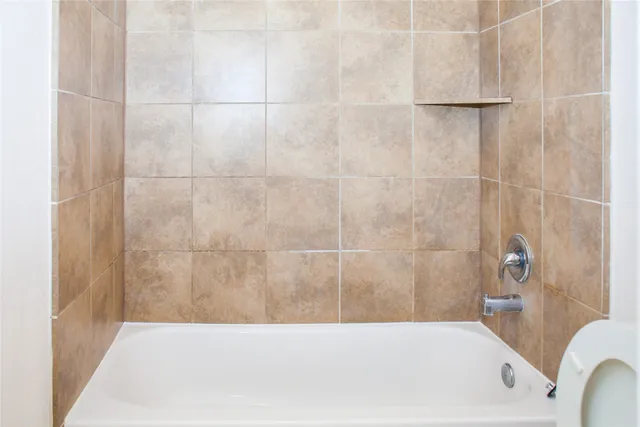 a bathroom with a bathtub