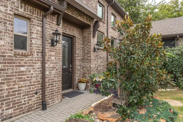 a view of a brick house with a door
