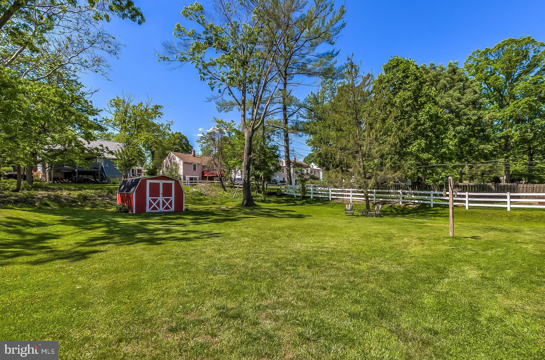 127 Cinder Road Lutherville-Timonium, MD 21093 - Photo 21 of 23 Wonderful backyard with lots of level play area.