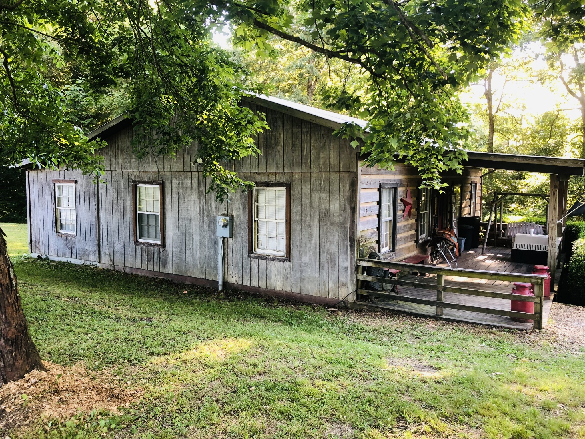 540 Archer Road Lafayette, TN 37083 - Photo 3 of 12 a view of a house with backyard and sitting area