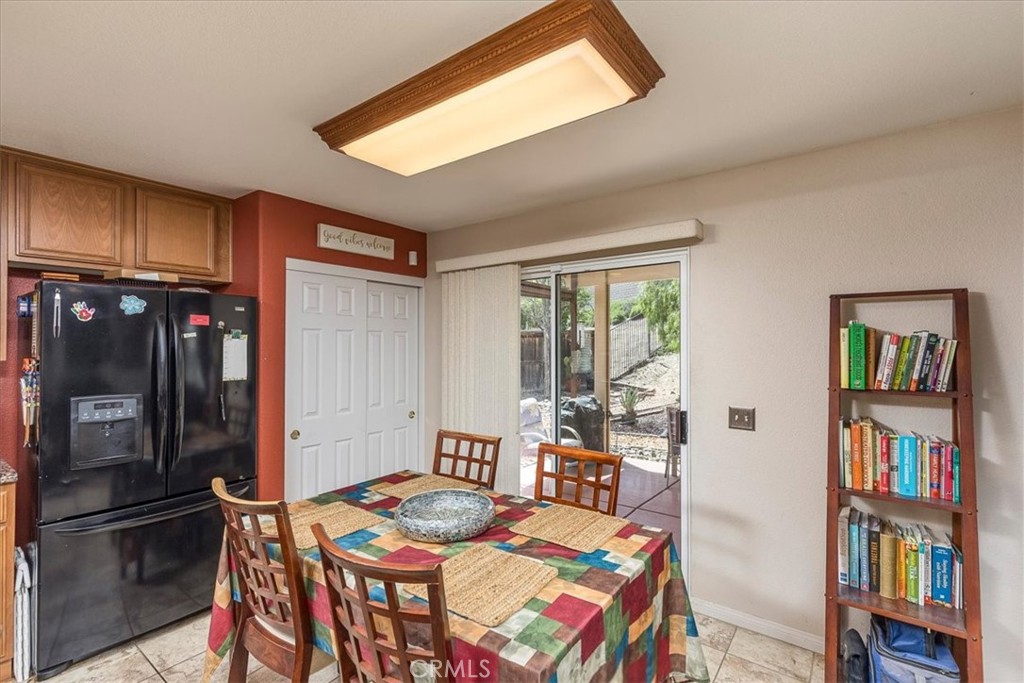 28984 Escalante Road Menifee, CA 92587 - Photo 9 of 40 Eating area with pantry and access to back patio