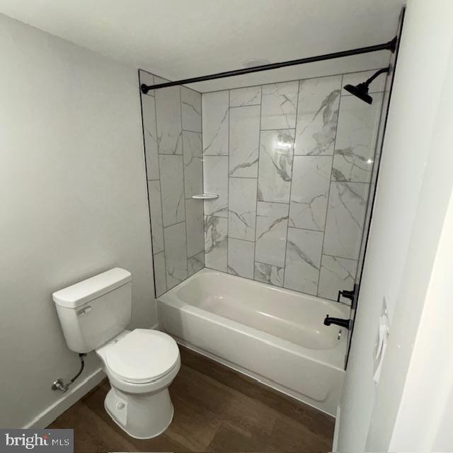 2317 Callow Avenue, Unit B Baltimore, MD 21217 - Photo 4 of 5 a bathroom with a toilet and a bathtub