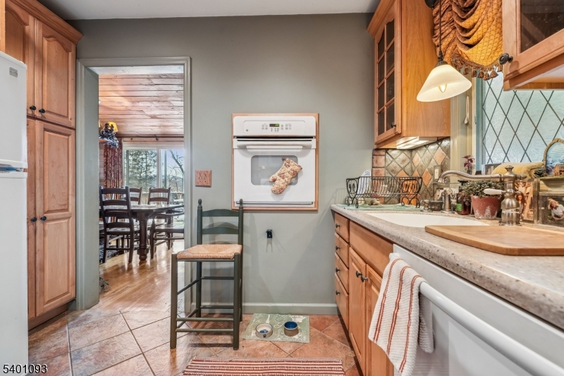 54 Hillside Road Sparta, NJ 07871 - Photo 13 of 45 a view of a kitchen area with furniture and window