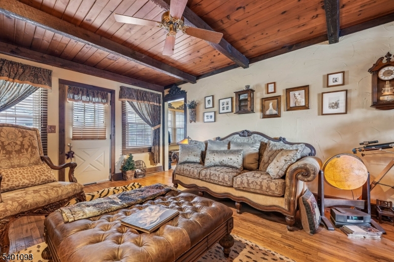 54 Hillside Road Sparta, NJ 07871 - Photo 14 of 45 a living room with furniture and a large window