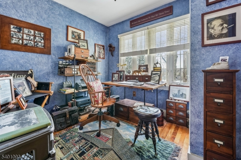 54 Hillside Road Sparta, NJ 07871 - Photo 15 of 45 a view of a workspace with furniture and a window