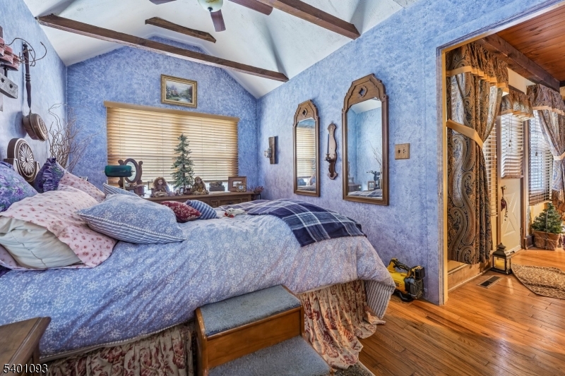 54 Hillside Road Sparta, NJ 07871 - Photo 17 of 45 a living room with furniture and wooden floor