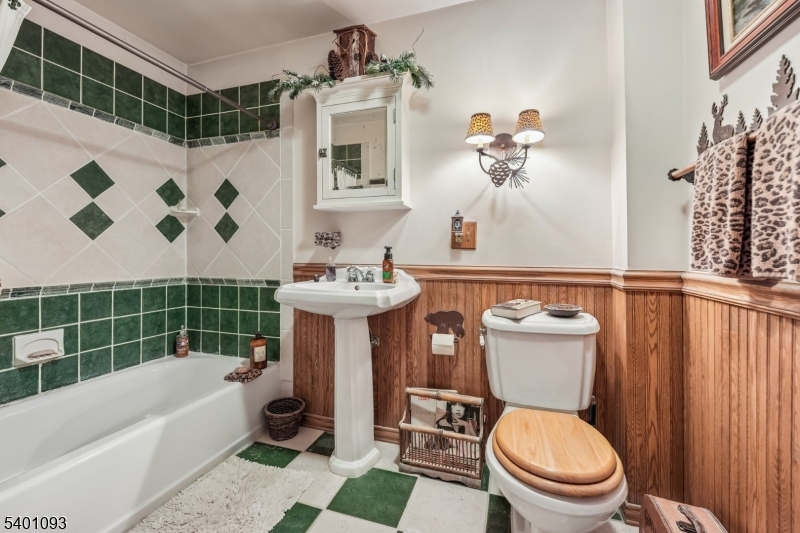 54 Hillside Road Sparta, NJ 07871 - Photo 18 of 45 a bathroom with a sink toilet and shower