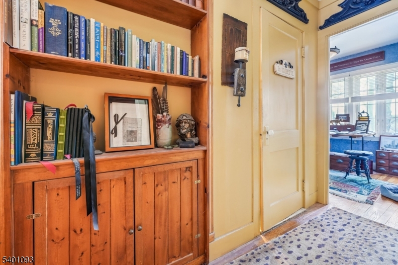 54 Hillside Road Sparta, NJ 07871 - Photo 19 of 45 a view of a hallway with a dining area