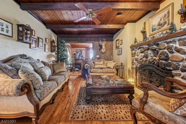 a living room with furniture and a rug