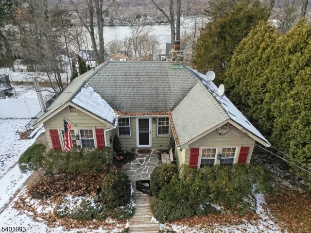 a house view with a garden space