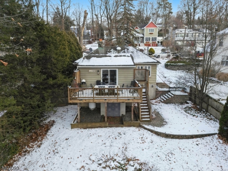 54 Hillside Road Sparta, NJ 07871 - Photo 44 of 45 a view of a house with roof deck and sitting area
