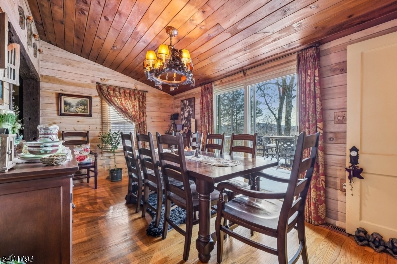 54 Hillside Road Sparta, NJ 07871 - Photo 8 of 45 a view of a dining room with furniture window and wooden floor