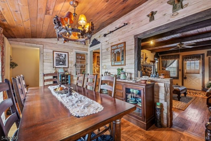 54 Hillside Road Sparta, NJ 07871 - Photo 10 of 45 a view of a dining room with furniture window and wooden floor