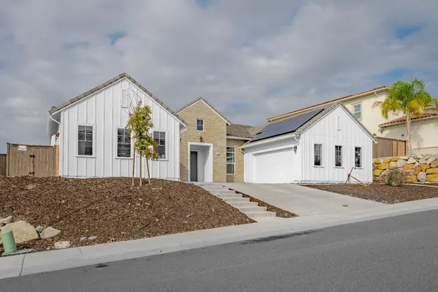 a view of a house with a patio