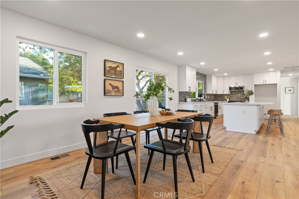 4150 Lobos Avenue Atascadero, CA 93422 - Photo 17 of 59 a view of a dining room with furniture and wooden floor