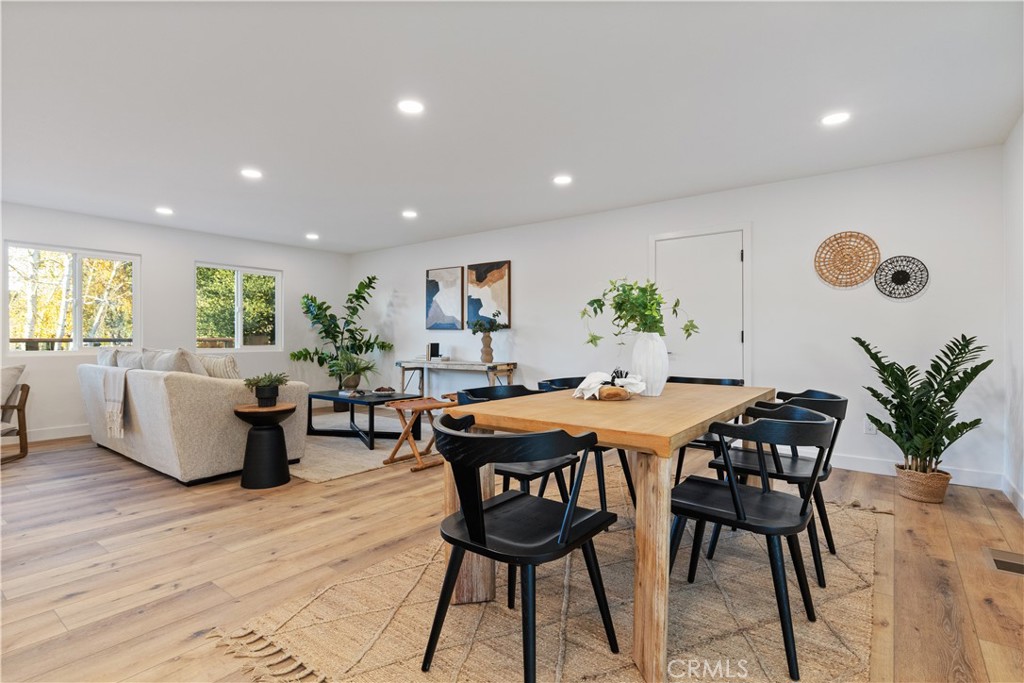 4150 Lobos Avenue Atascadero, CA 93422 - Photo 19 of 59 a view of a dining room with furniture and wooden floor