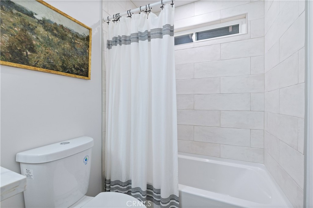 4150 Lobos Avenue Atascadero, CA 93422 - Photo 35 of 59 a bathroom with a toilet and a shower