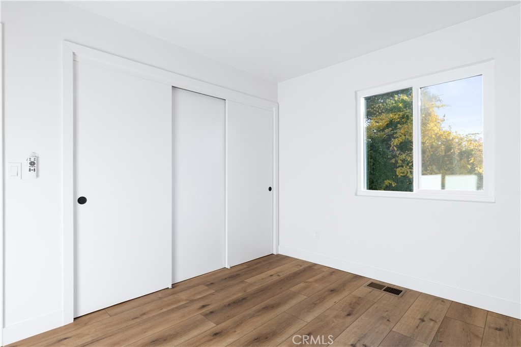 4150 Lobos Avenue Atascadero, CA 93422 - Photo 38 of 59 a view of empty room with wooden floor and fan