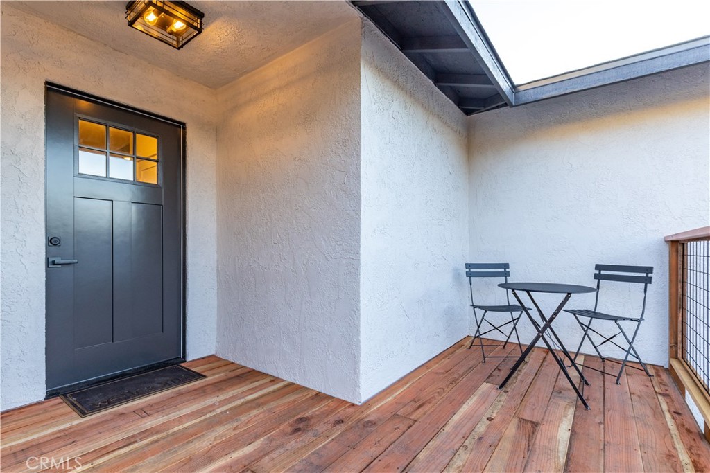 4150 Lobos Avenue Atascadero, CA 93422 - Photo 4 of 59 a view of a livingroom with wooden floor and furniture