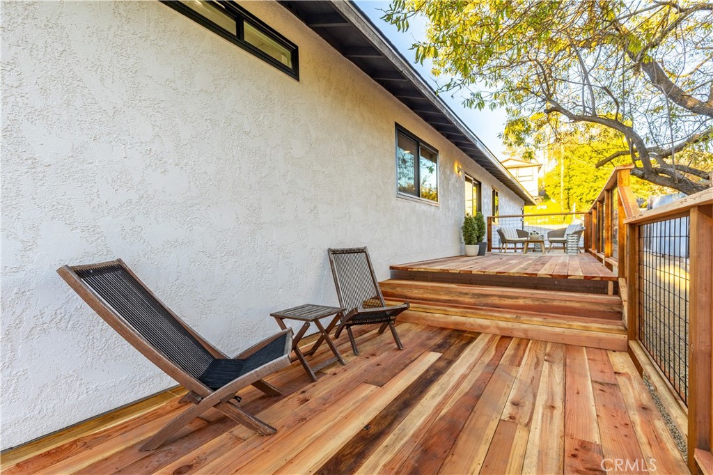 4150 Lobos Avenue Atascadero, CA 93422 - Photo 52 of 59 a view of a balcony with chairs and wooden floor