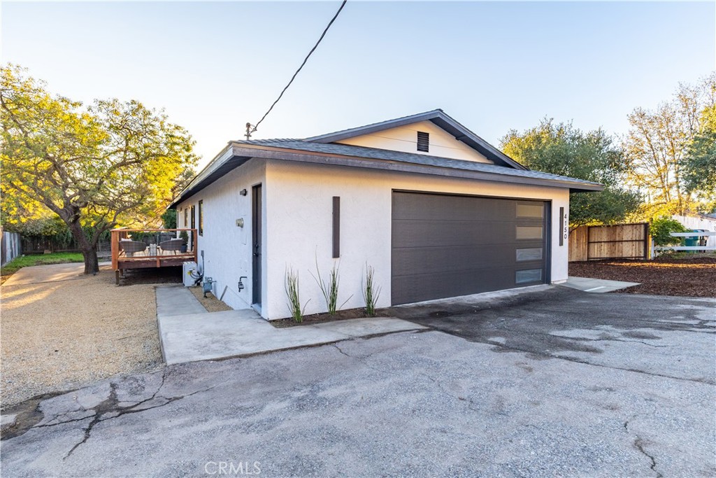 4150 Lobos Avenue Atascadero, CA 93422 - Photo 59 of 59 a view of a house with a yard and garage