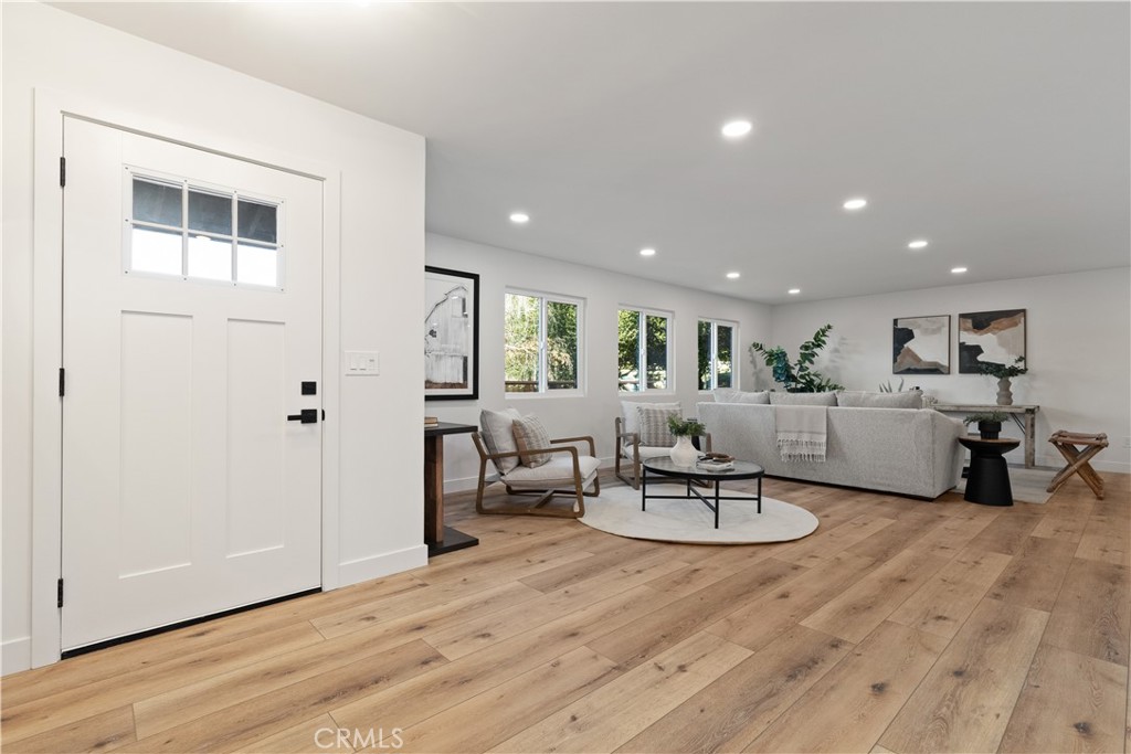 4150 Lobos Avenue Atascadero, CA 93422 - Photo 7 of 59 a living room with furniture and a wooden floor