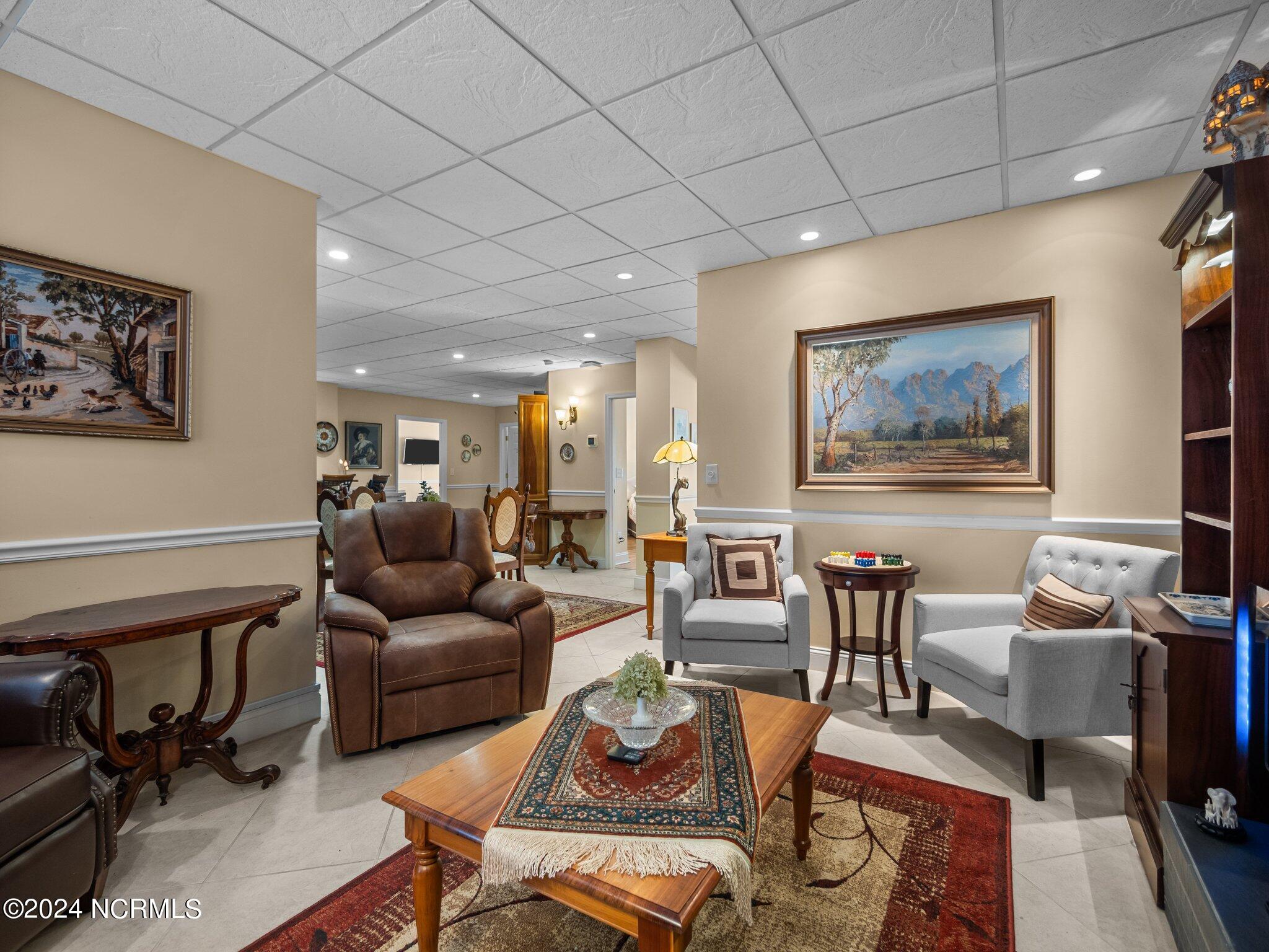 2000 New River Inlet Road, Unit 1004 North Topsail Beach, NC 28460 - Photo 28 of 48 Living room
