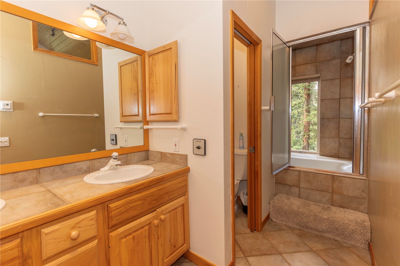 760 Penstemon Road Keystone, CO 80435 - Photo 21 of 39 Bathroom with vanity and tile patterned flooring