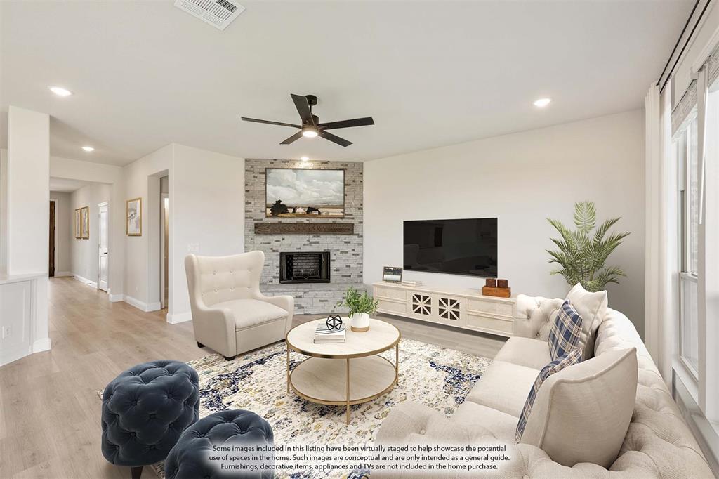 2000 Hickory Chase Lane Anna, TX 75409 - Photo 18 of 40 a living room with furniture and a flat screen tv