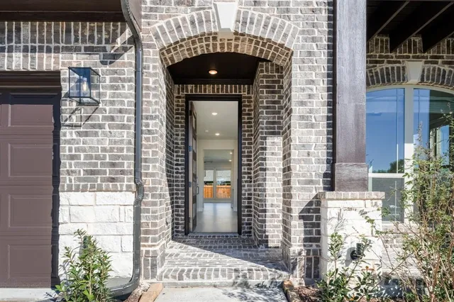 a front view of a house with a glass door