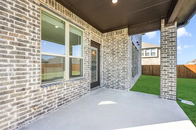 a view of a backyard of a house