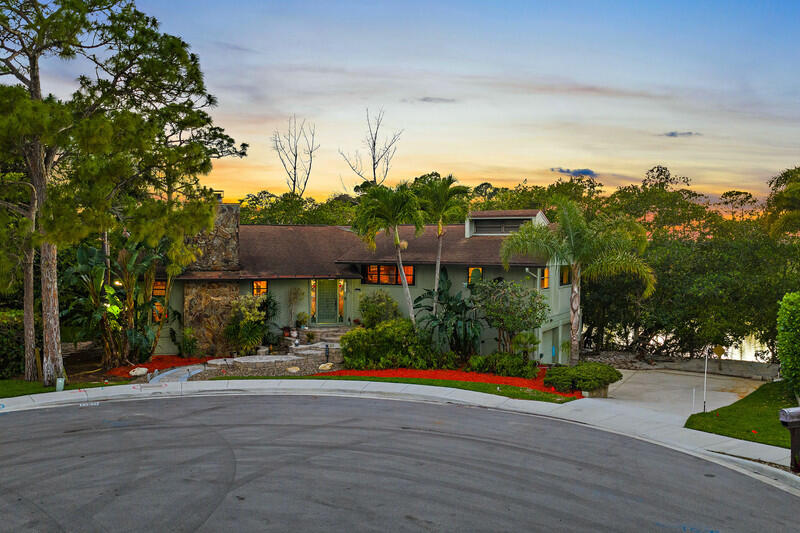 702 Warren Drive Jupiter, FL 33458 - Photo 73 of 76 a view of building with yard