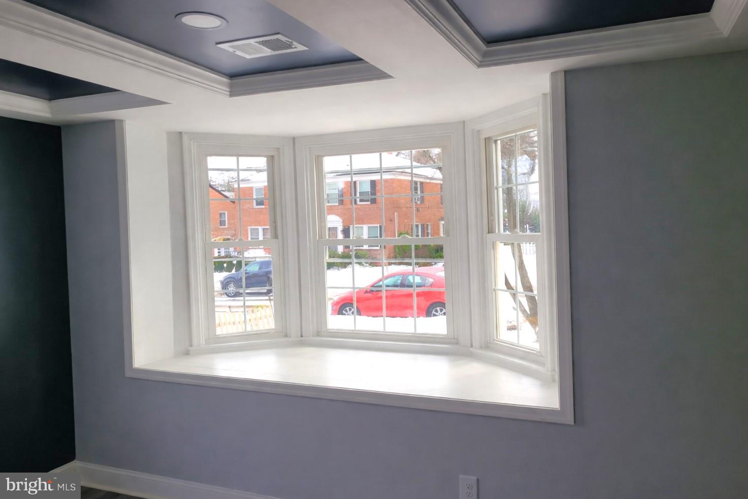 402 Croydon Road Baltimore, MD 21212 - Photo 4 of 4 a view of a room that has a window and a kitchen space