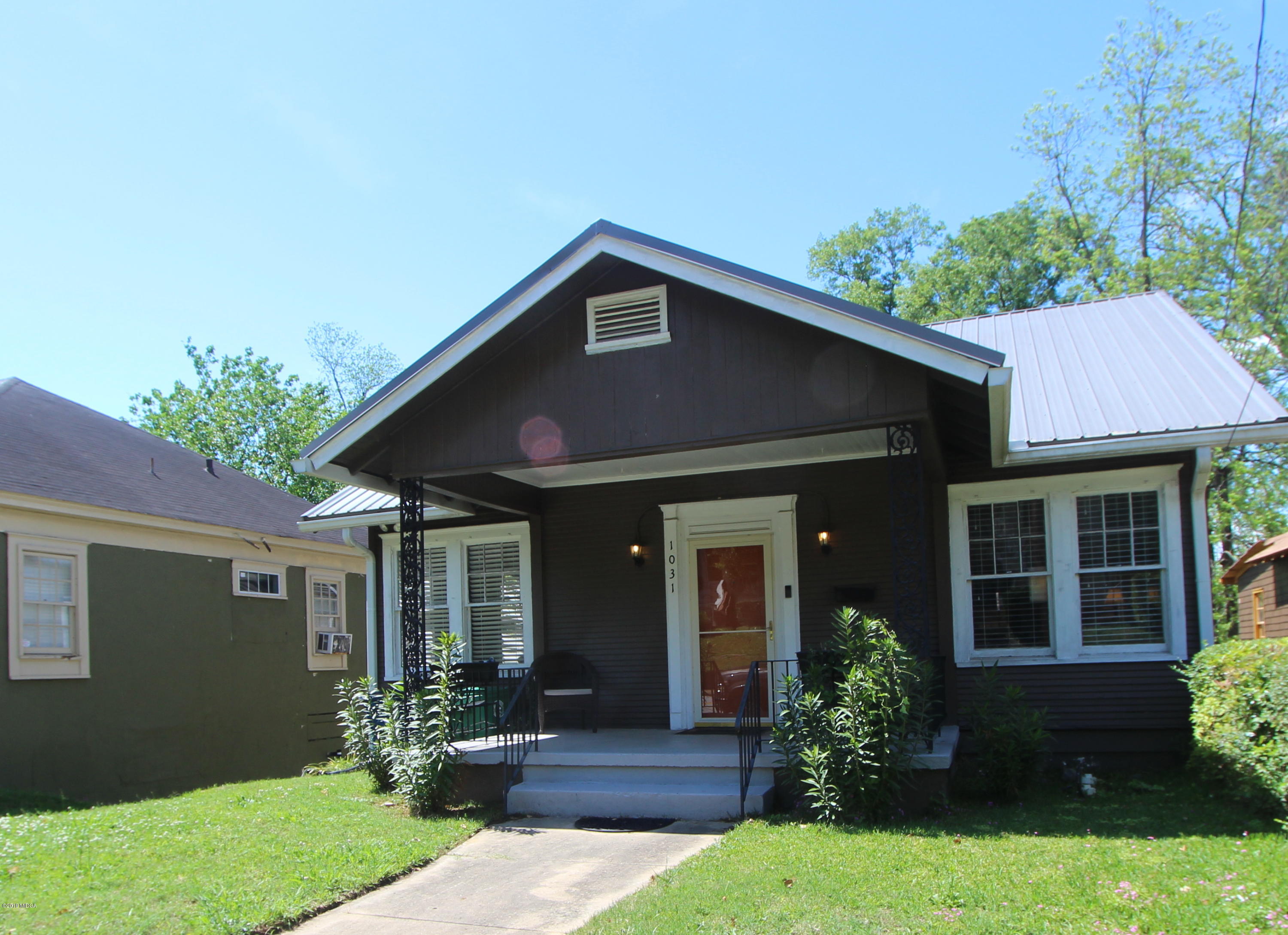 1031 Adams Street Macon, GA 31201 - Photo 1 of 37 1-SunnyFrontofHouse