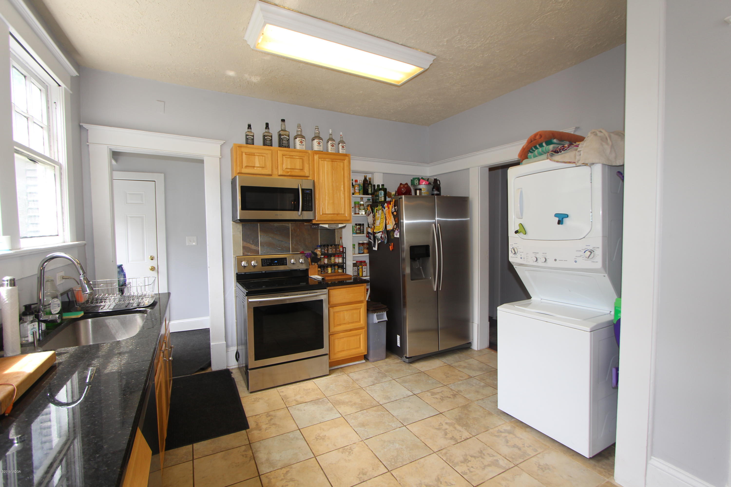 1031 Adams Street Macon, GA 31201 - Photo 10 of 37 10-Kitchen_Laundry