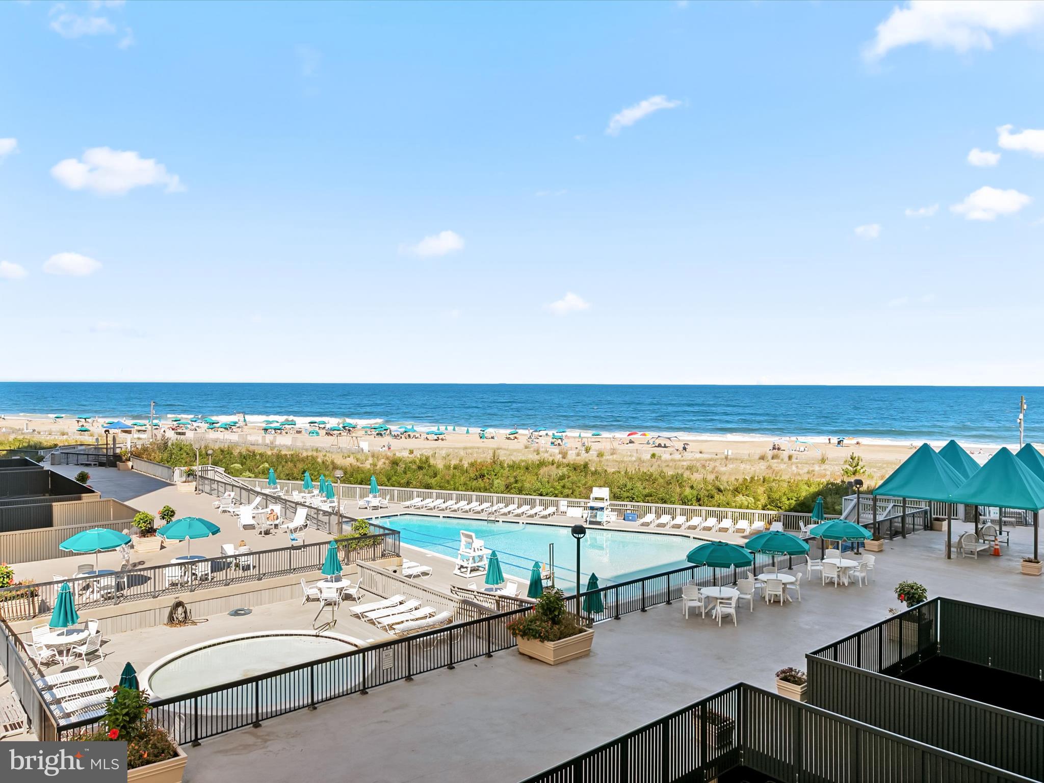 311 Georgetown House Bethany Beach, DE 19930 - Photo 27 of 48 a view of a terrace with lawn chairs
