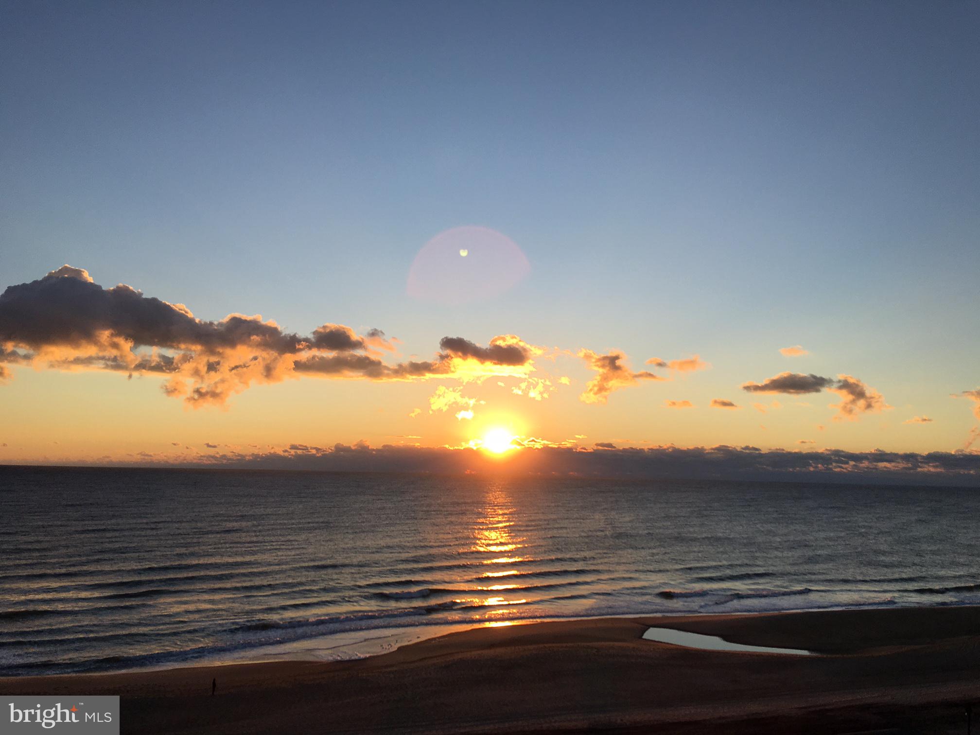 311 Georgetown House Bethany Beach, DE 19930 - Photo 33 of 48 a view of an ocean and a mountain