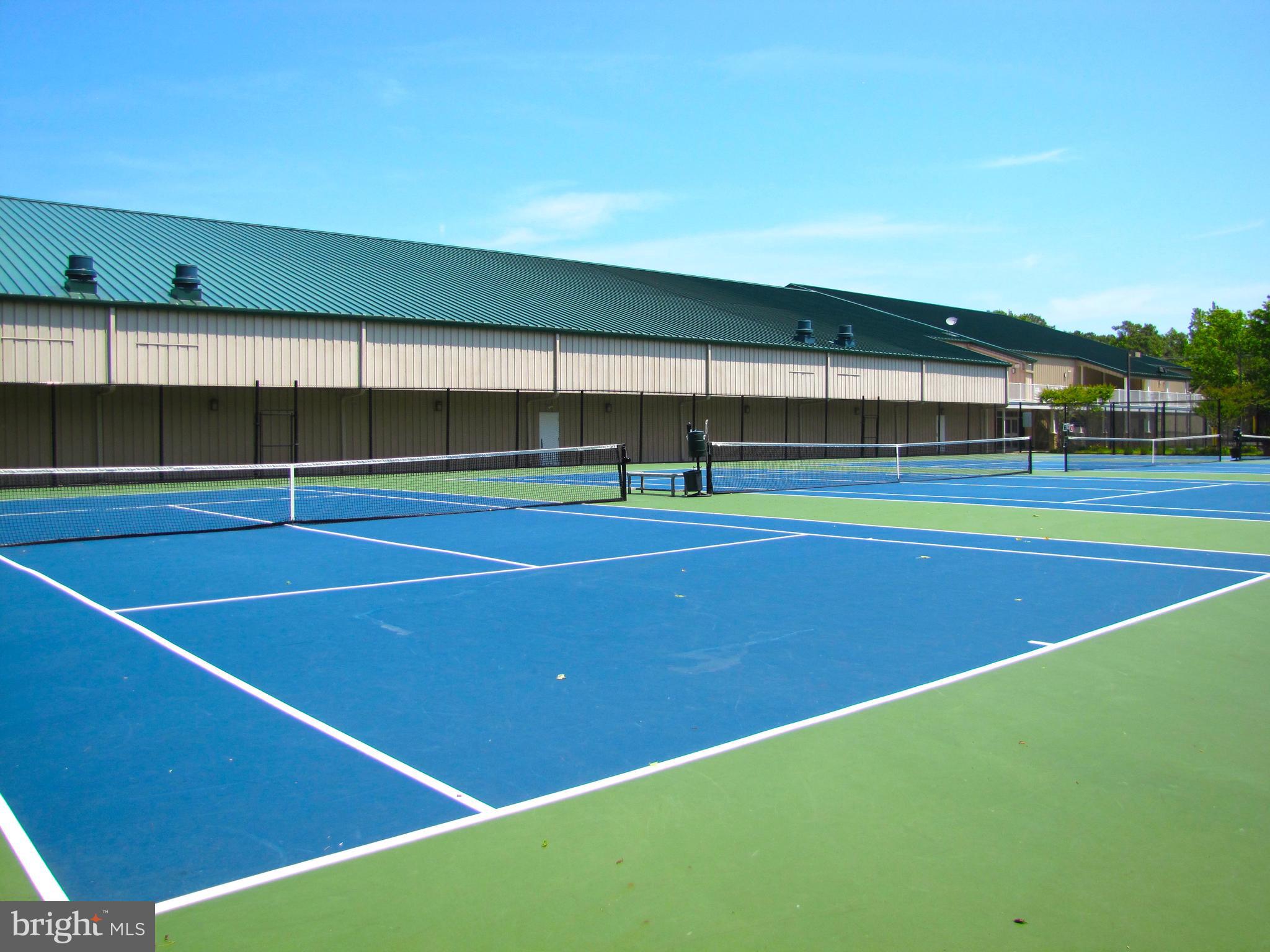 311 Georgetown House Bethany Beach, DE 19930 - Photo 45 of 48 a view of an outdoor space and basketball court