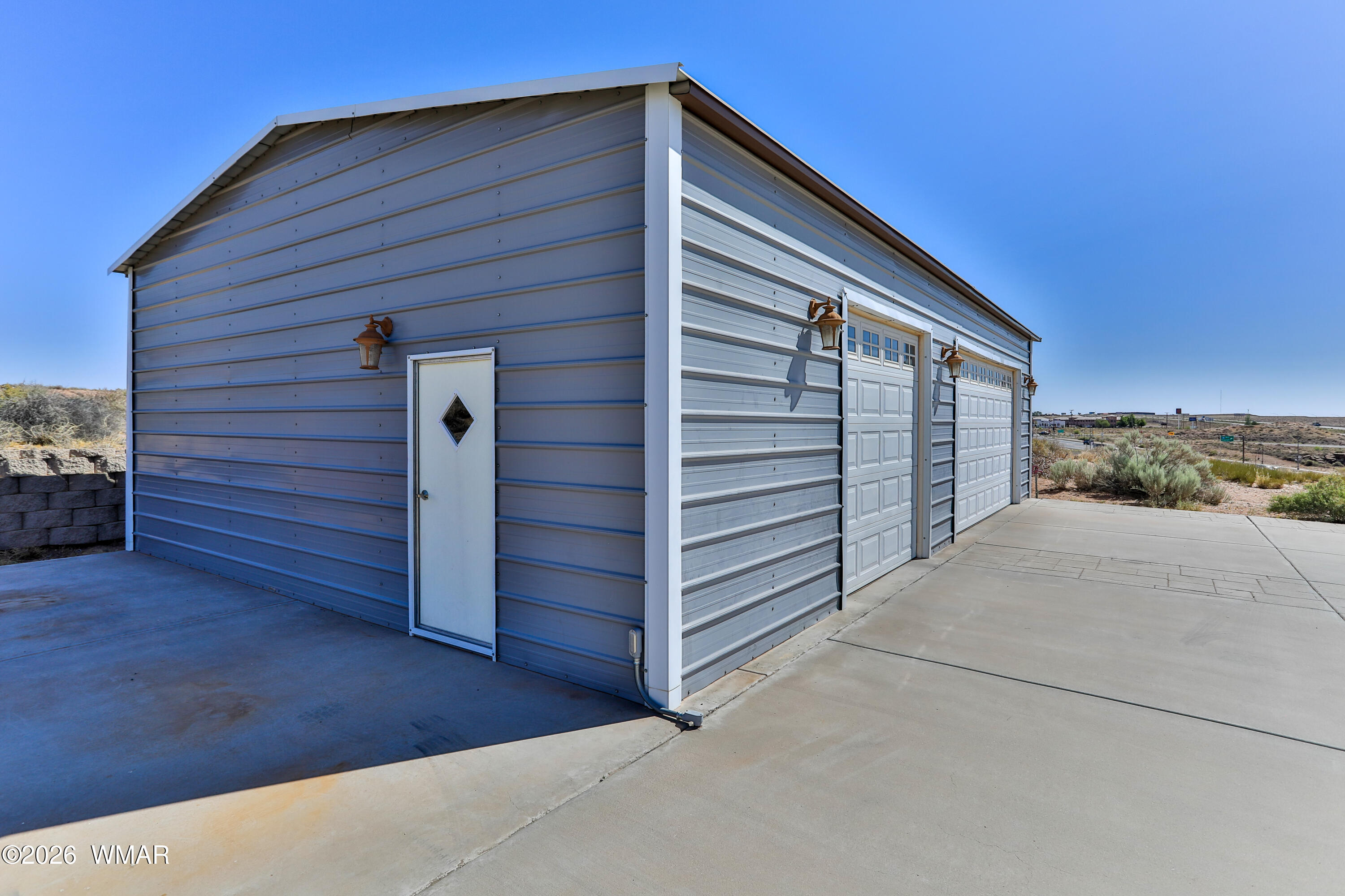 102 Crestview Road Holbrook, AZ 86025 - Photo 44 of 55 a view of wooden house with a large window