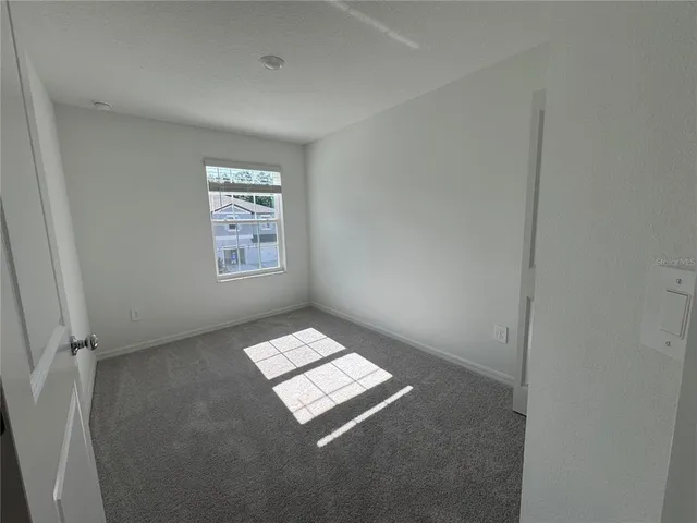 a bathroom with a sink mirror toilet and bathtub