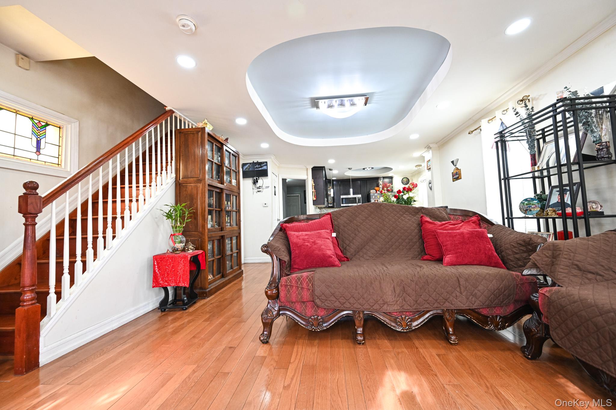 176-25 133rd Road Queens, NY 11434 - Photo 6 of 15 a living room with furniture and a wooden floor
