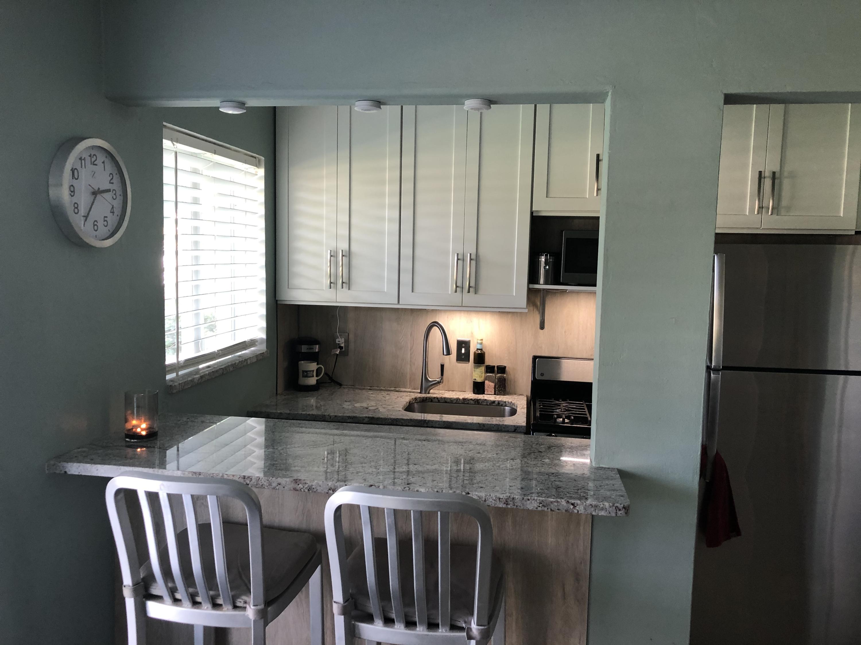 1006 Casuarina Road, Unit 5 Delray Beach, FL 33483 - Photo 4 of 18 Kitchen with granite tops
