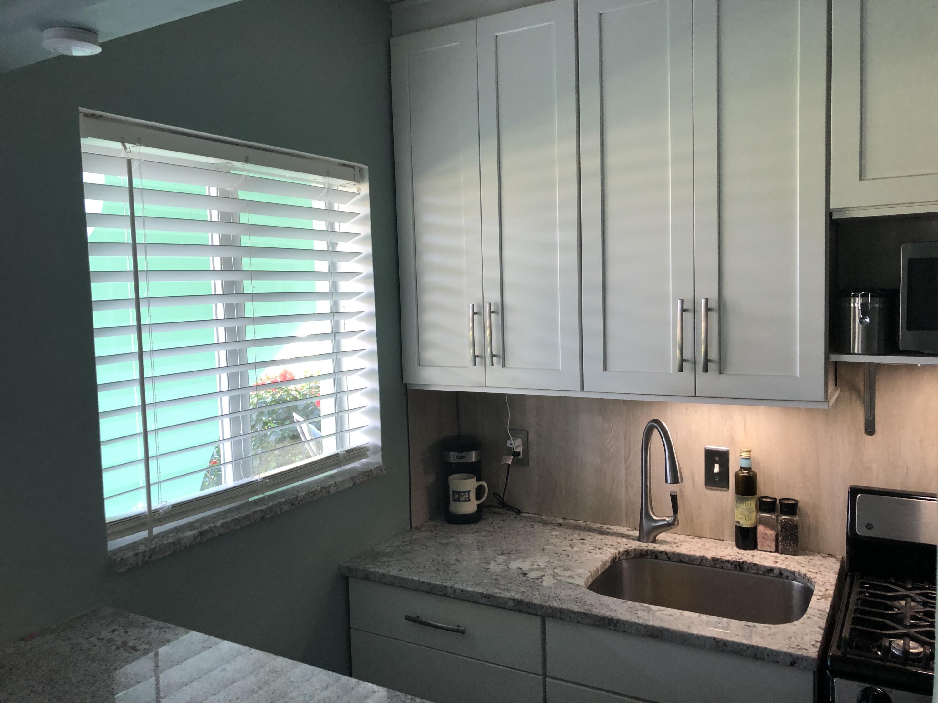 1006 Casuarina Road, Unit 5 Delray Beach, FL 33483 - Photo 7 of 18 Window in kitchen, lots of light
