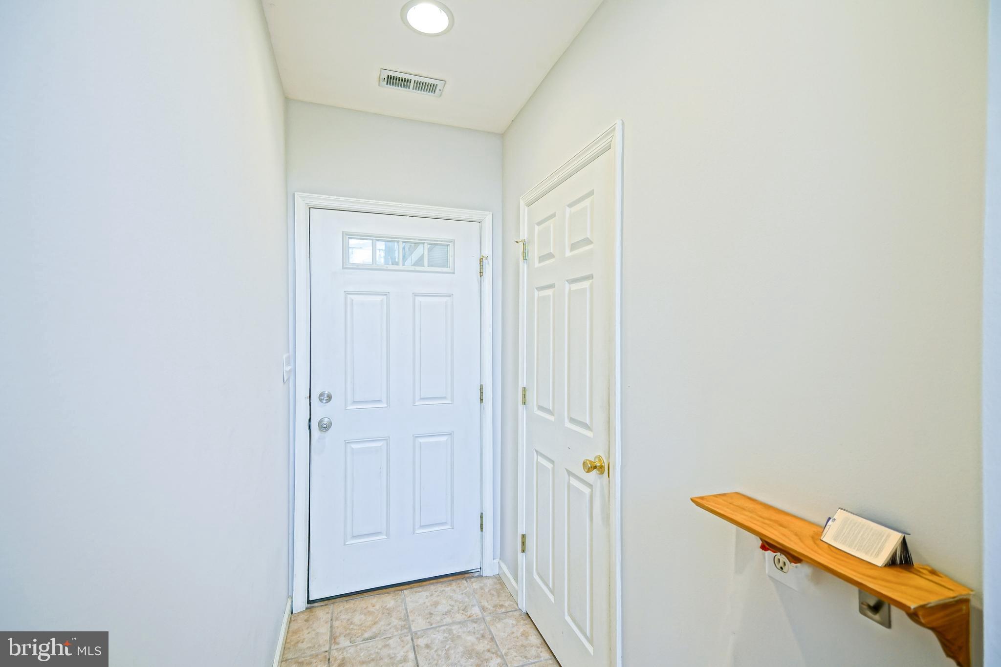 21224 Robin Road Rehoboth Beach, DE 19971 - Photo 54 of 90 Ground Level Foyer