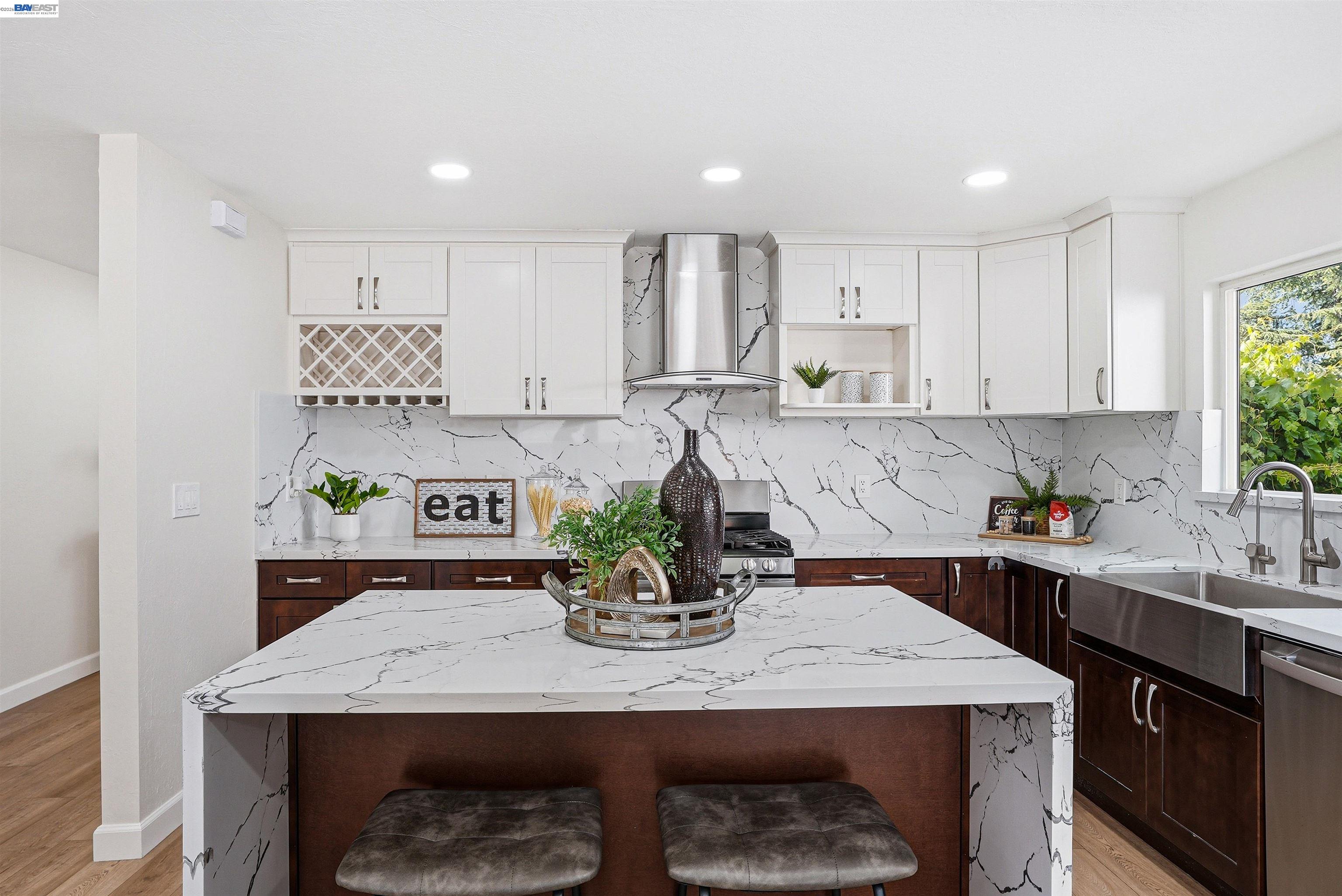 6738 Rancho Court Pleasanton, CA 94588 - Photo 14 of 33 a kitchen with a table and chairs in it
