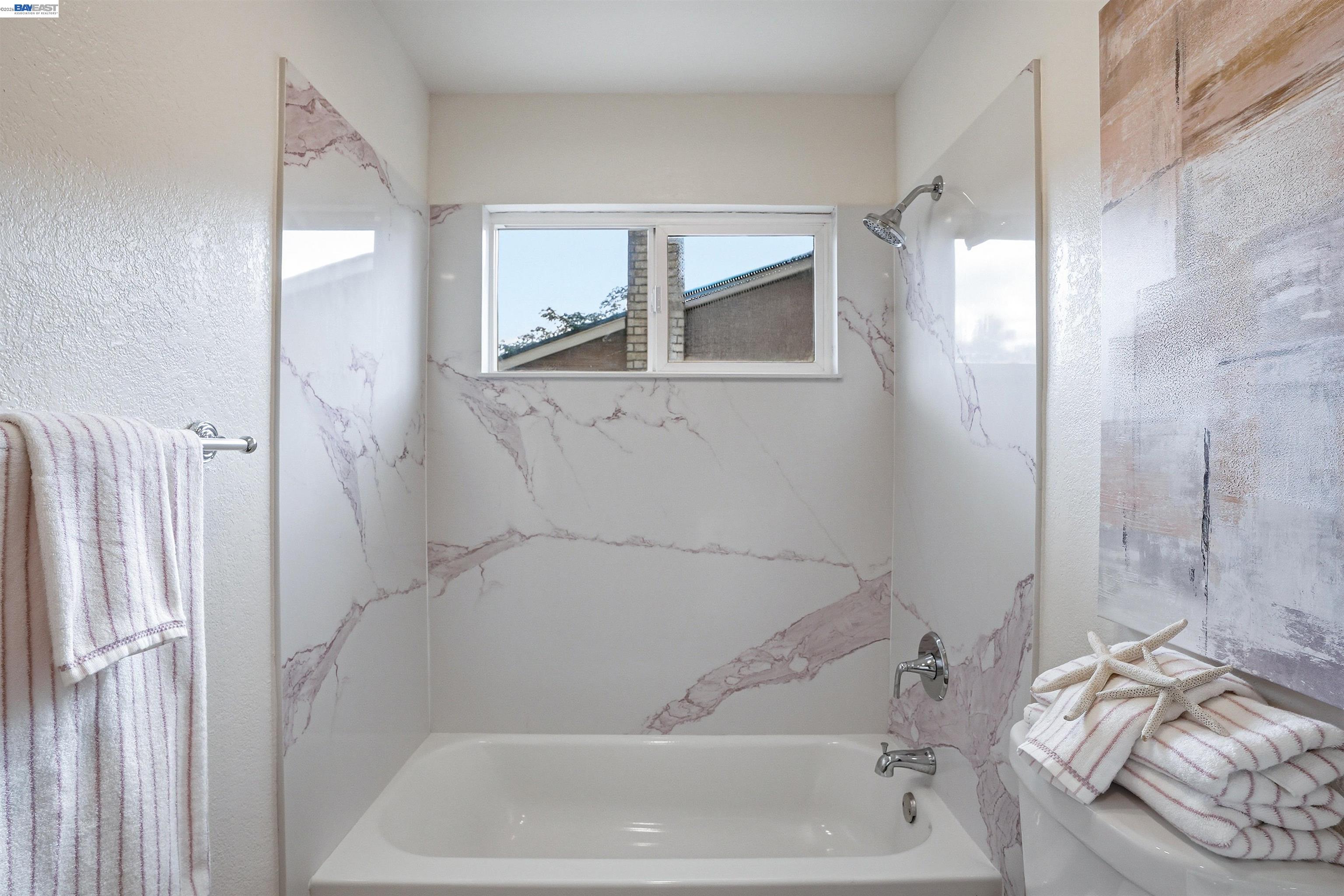 6738 Rancho Court Pleasanton, CA 94588 - Photo 20 of 33 a bathroom with a bathtub