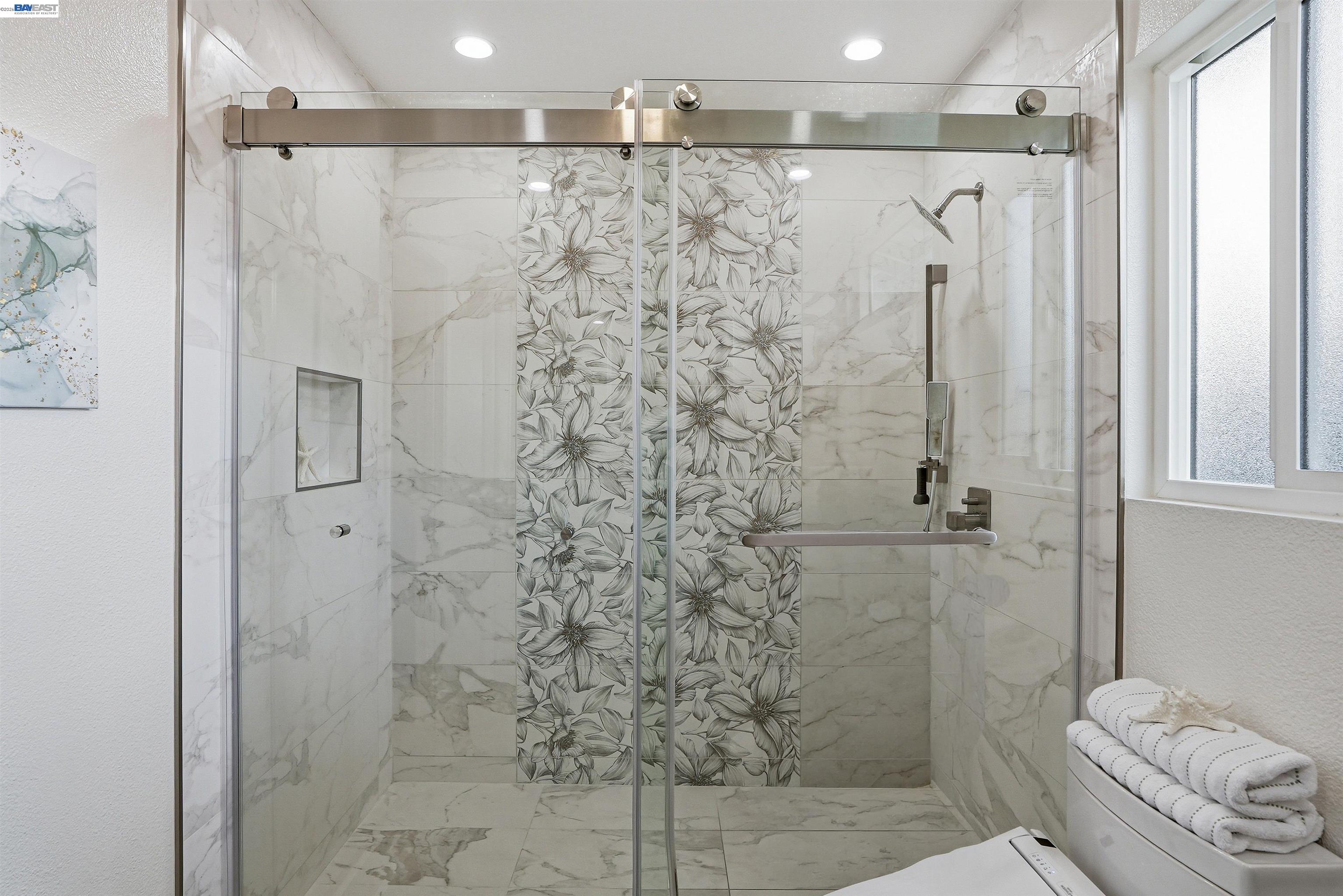 6738 Rancho Court Pleasanton, CA 94588 - Photo 28 of 33 a bathroom with a shower and a toilet