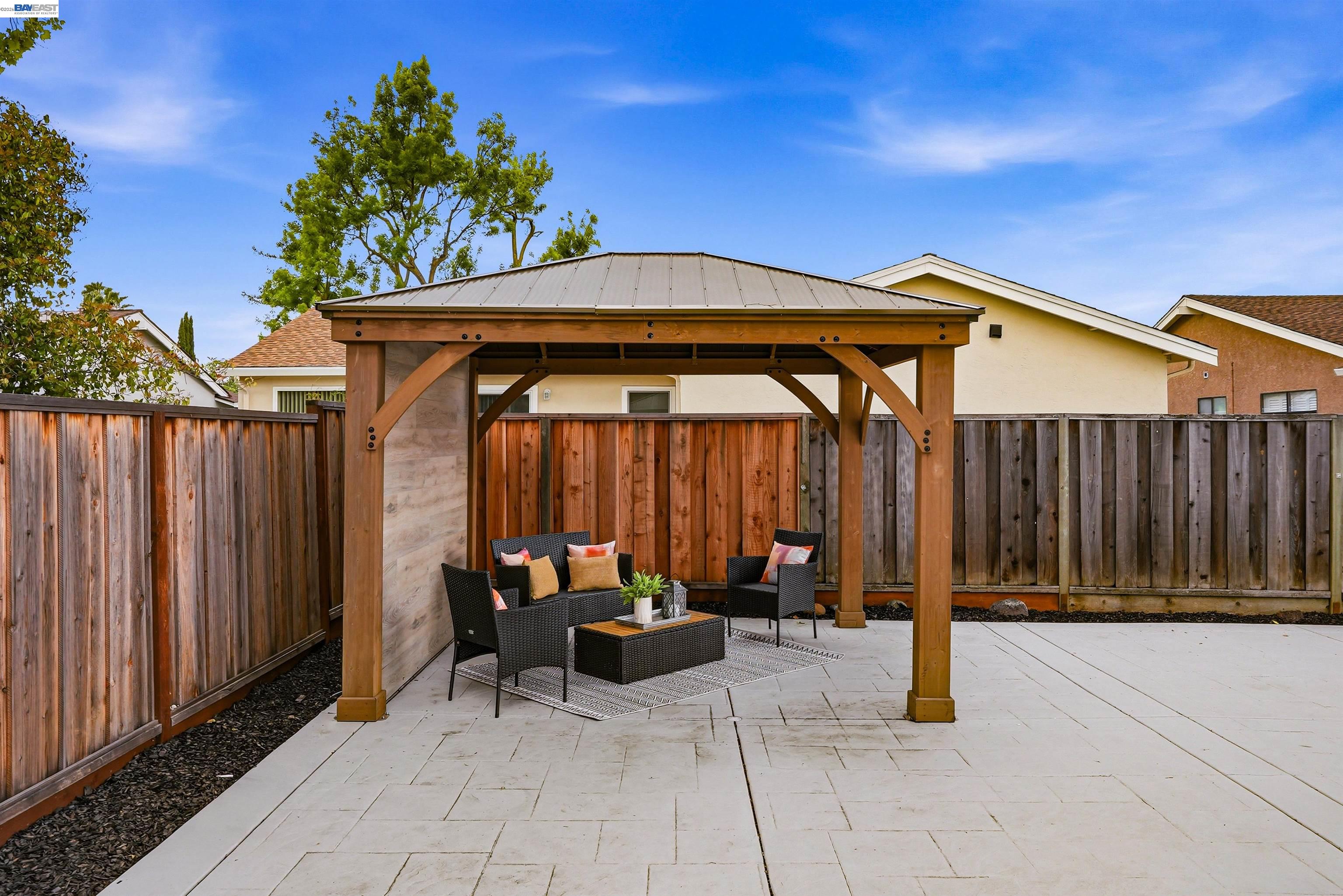6738 Rancho Court Pleasanton, CA 94588 - Photo 31 of 33 a view of a chairs and table in the patio