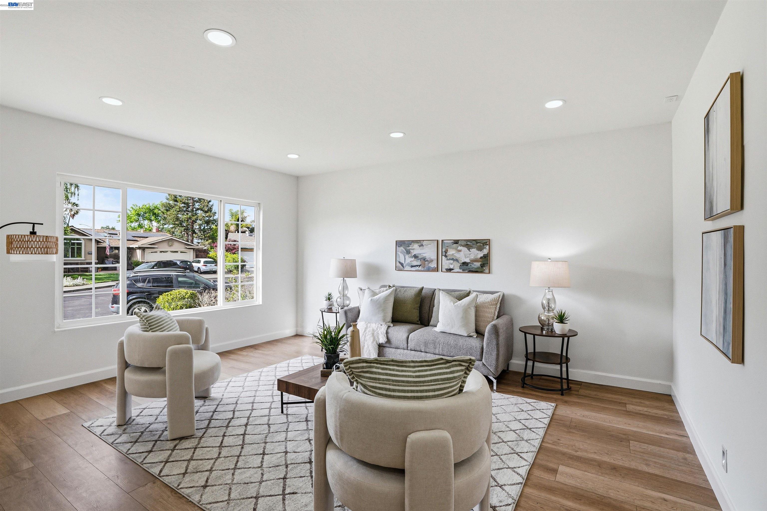 6738 Rancho Court Pleasanton, CA 94588 - Photo 5 of 33 a living room with furniture and a rug